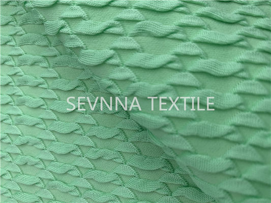 O fio poli da textura do verde da hortelã reciclou o Spandex de Repreve da tela do roupa de banho