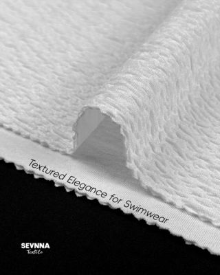 Tecido de malha dupla jacquard para produtos têxteis duráveis e versáteis