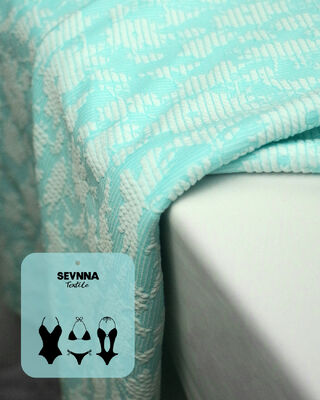 Tecido de natação texturizado premium com 135cm largura 195gm peso e 50% composição de poliéster reciclado