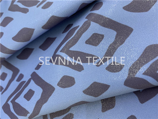 Tela impermeável da malha do estiramento de 4 maneiras para o nylon Lycra do verde de Eco da impressão da sublimação do totem das caneleiras